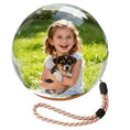 Load image into Gallery viewer, Clear sphere with a photo of a girl holding a dog, on a white background